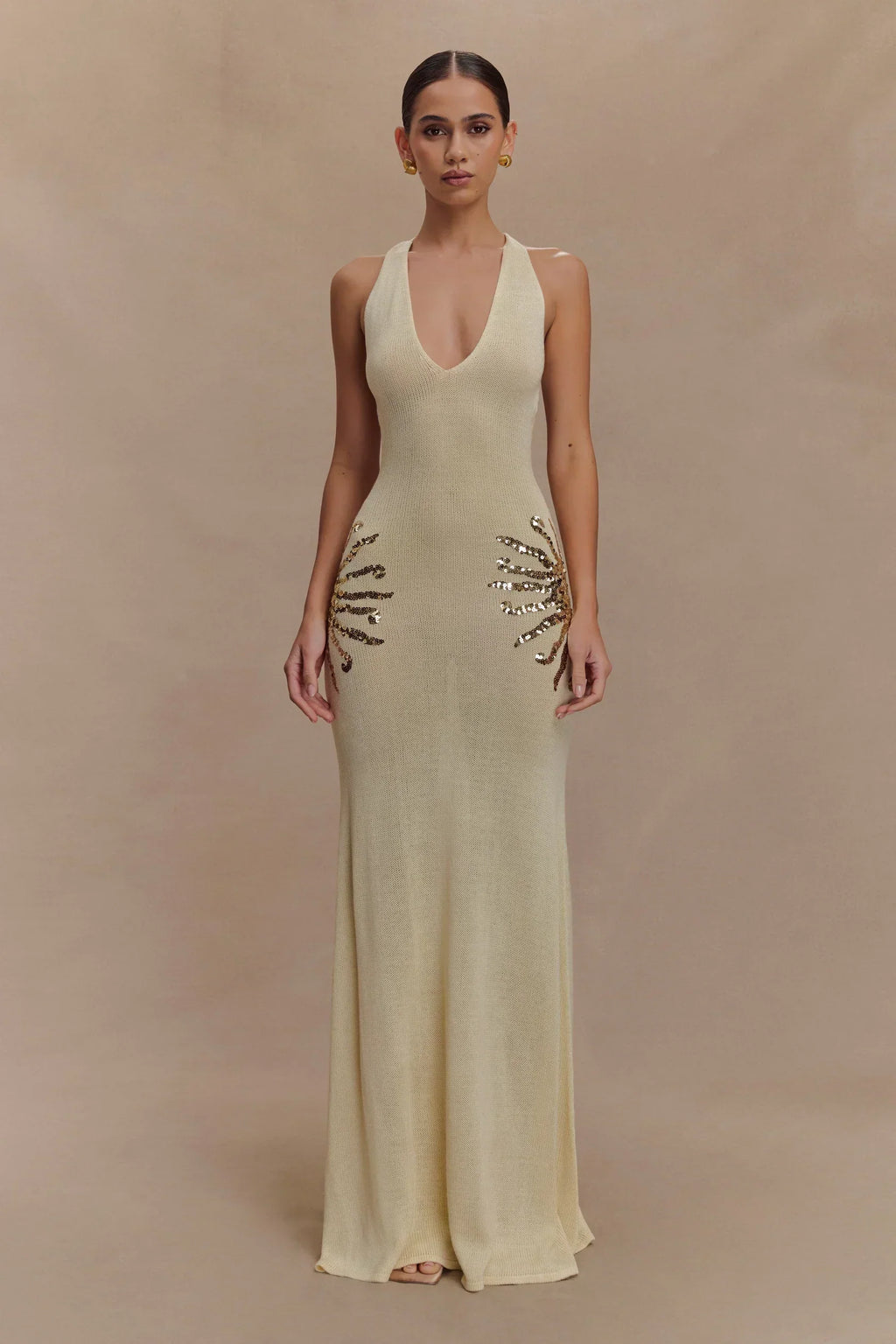 Plunging Open-Back Sequin Maxi Dress with Sunburst Design for Evening Wear