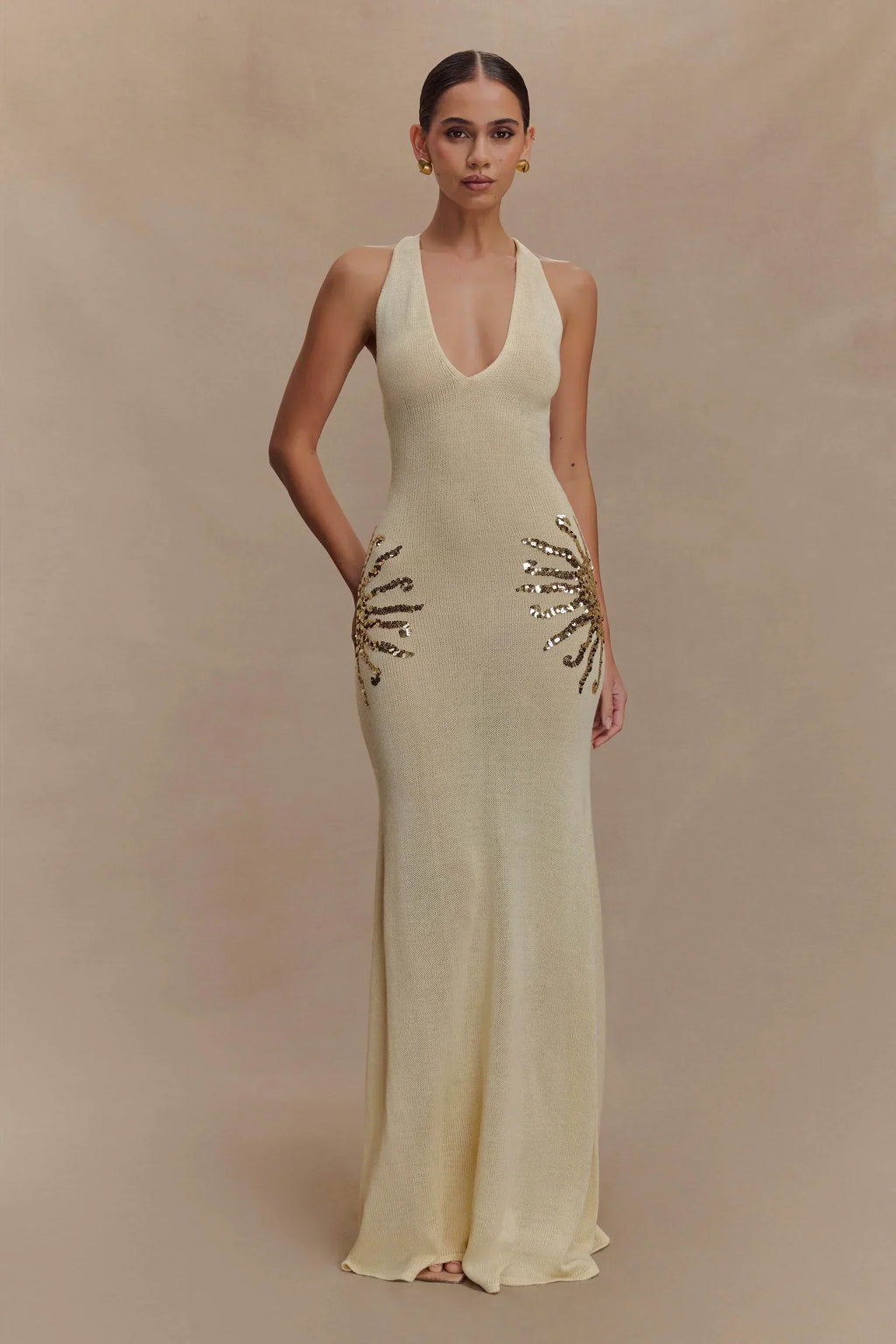 Plunging Open-Back Sequin Maxi Dress with Sunburst Design for Evening Wear