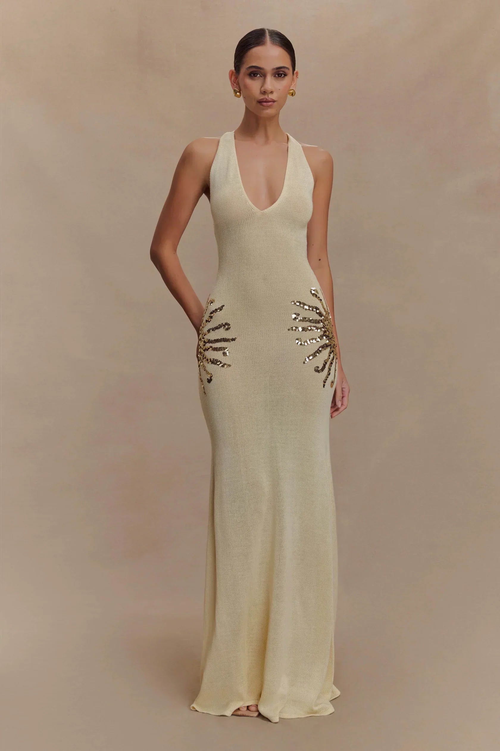 Plunging Open-Back Sequin Maxi Dress with Sunburst Design for Evening Wear