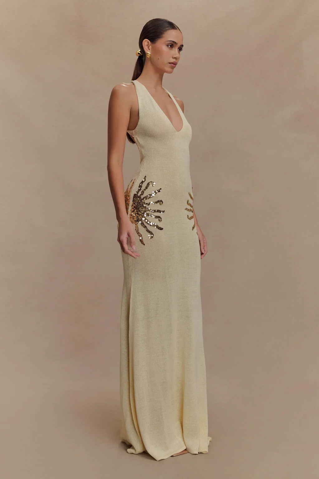 Plunging Open-Back Sequin Maxi Dress with Sunburst Design for Evening Wear