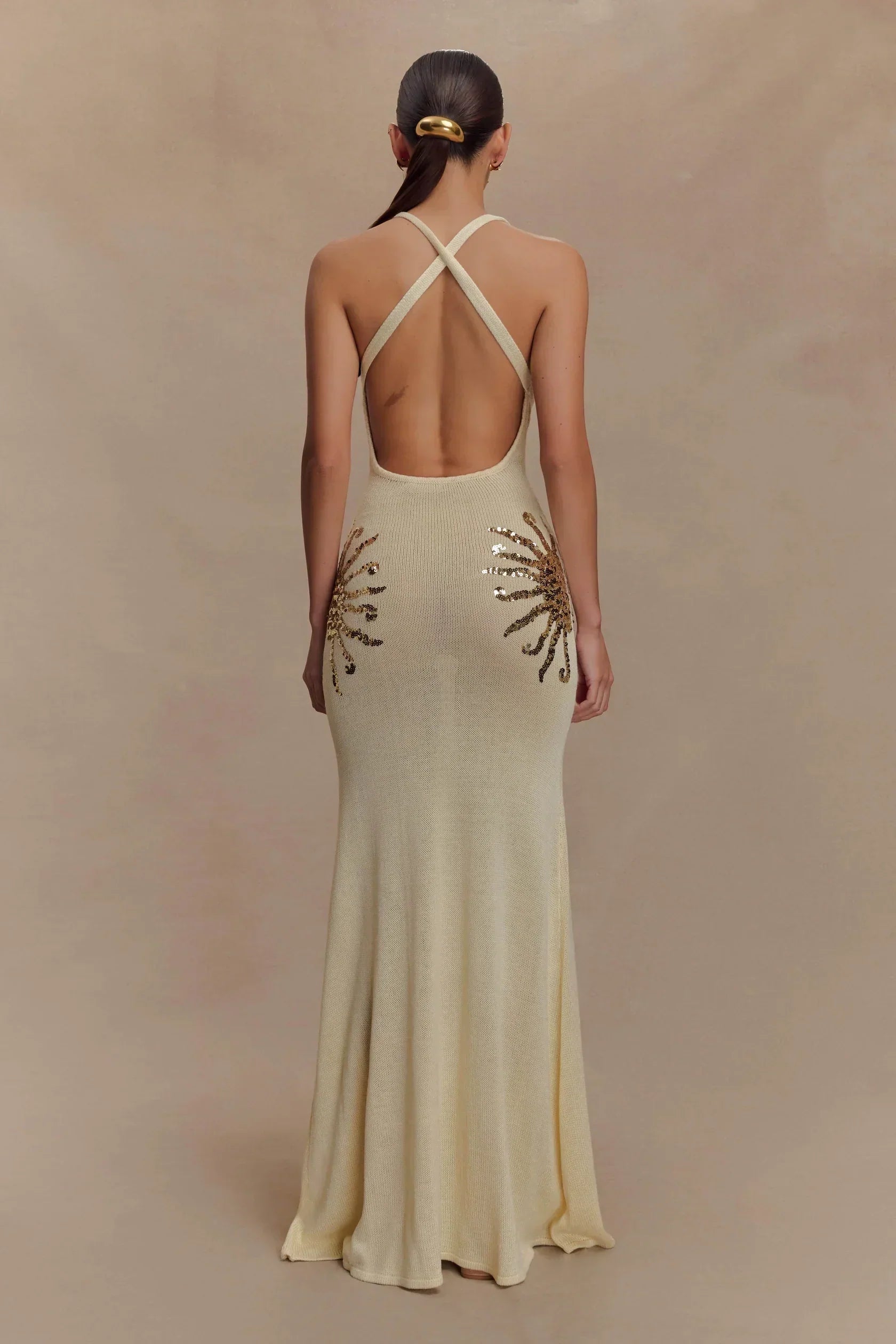 Plunging Open-Back Sequin Maxi Dress with Sunburst Design for Evening Wear