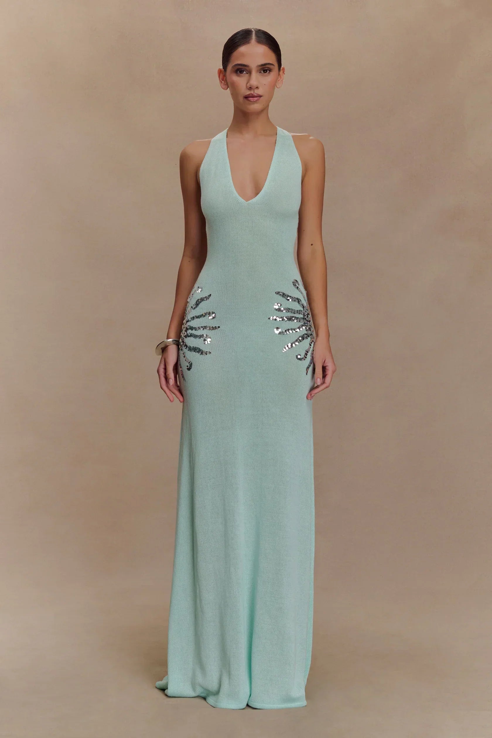 Plunging Open-Back Sequin Maxi Dress with Sunburst Design for Evening Wear