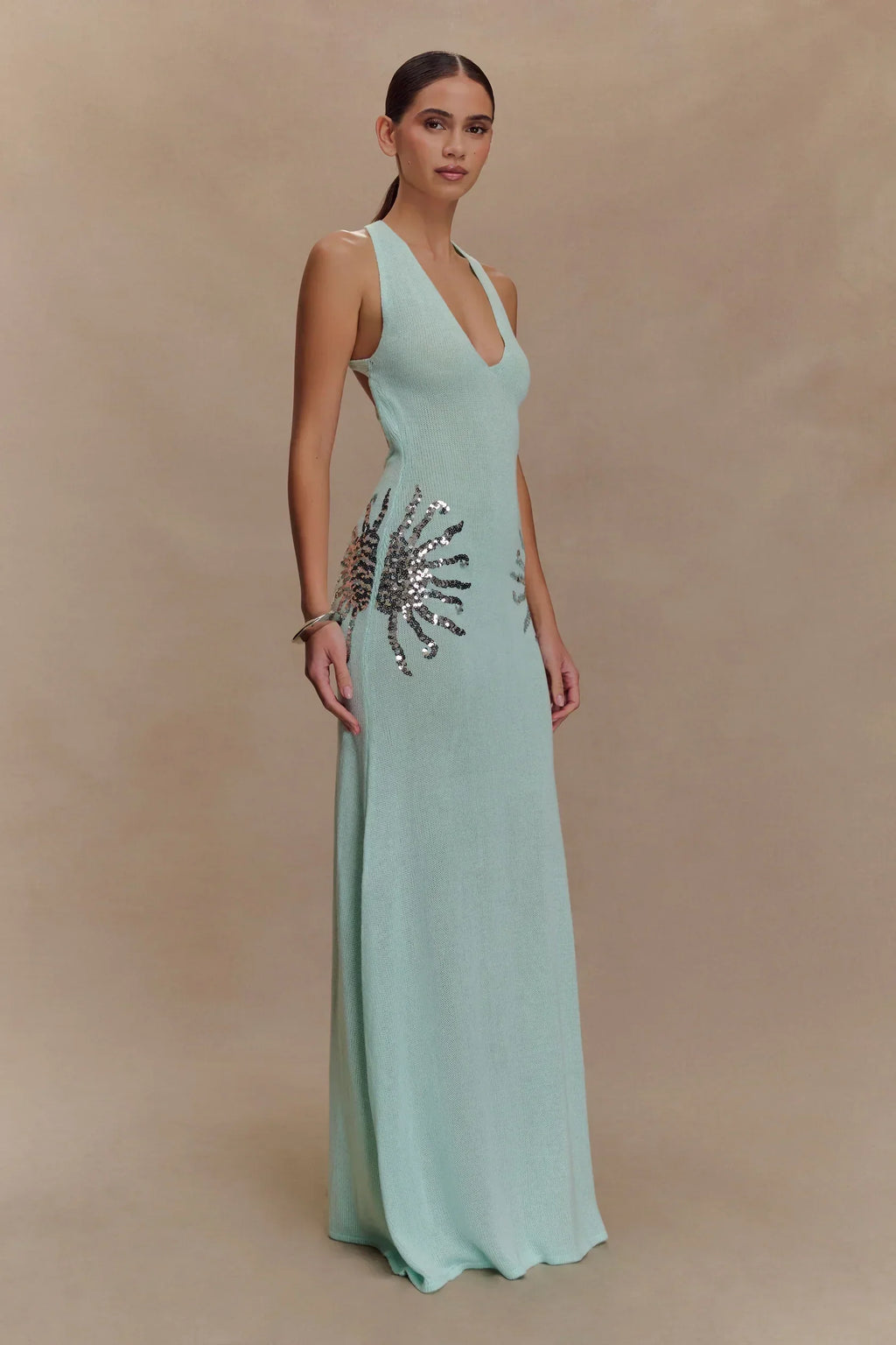Plunging Open-Back Sequin Maxi Dress with Sunburst Design for Evening Wear