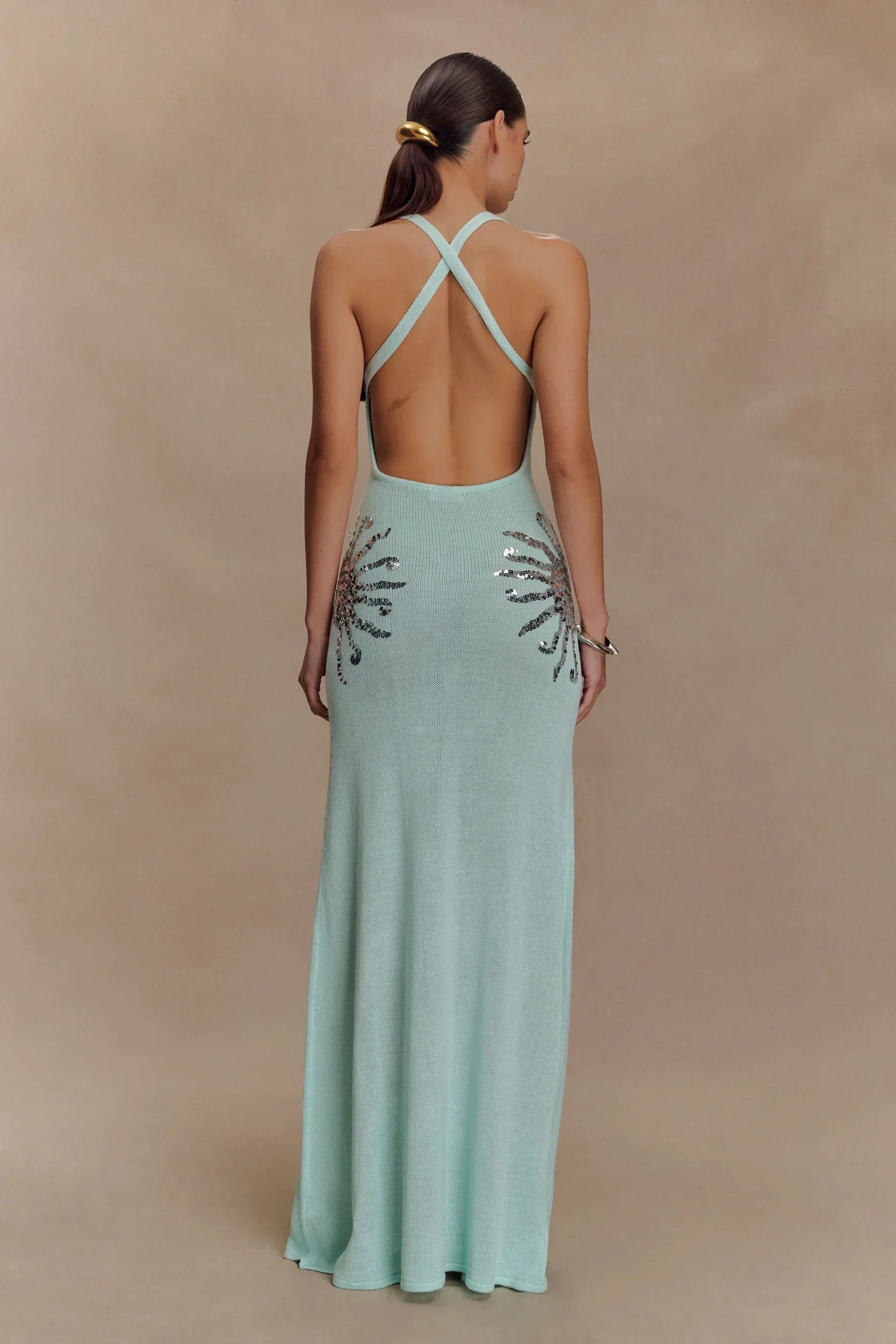 Plunging Open-Back Sequin Maxi Dress with Sunburst Design for Evening Wear