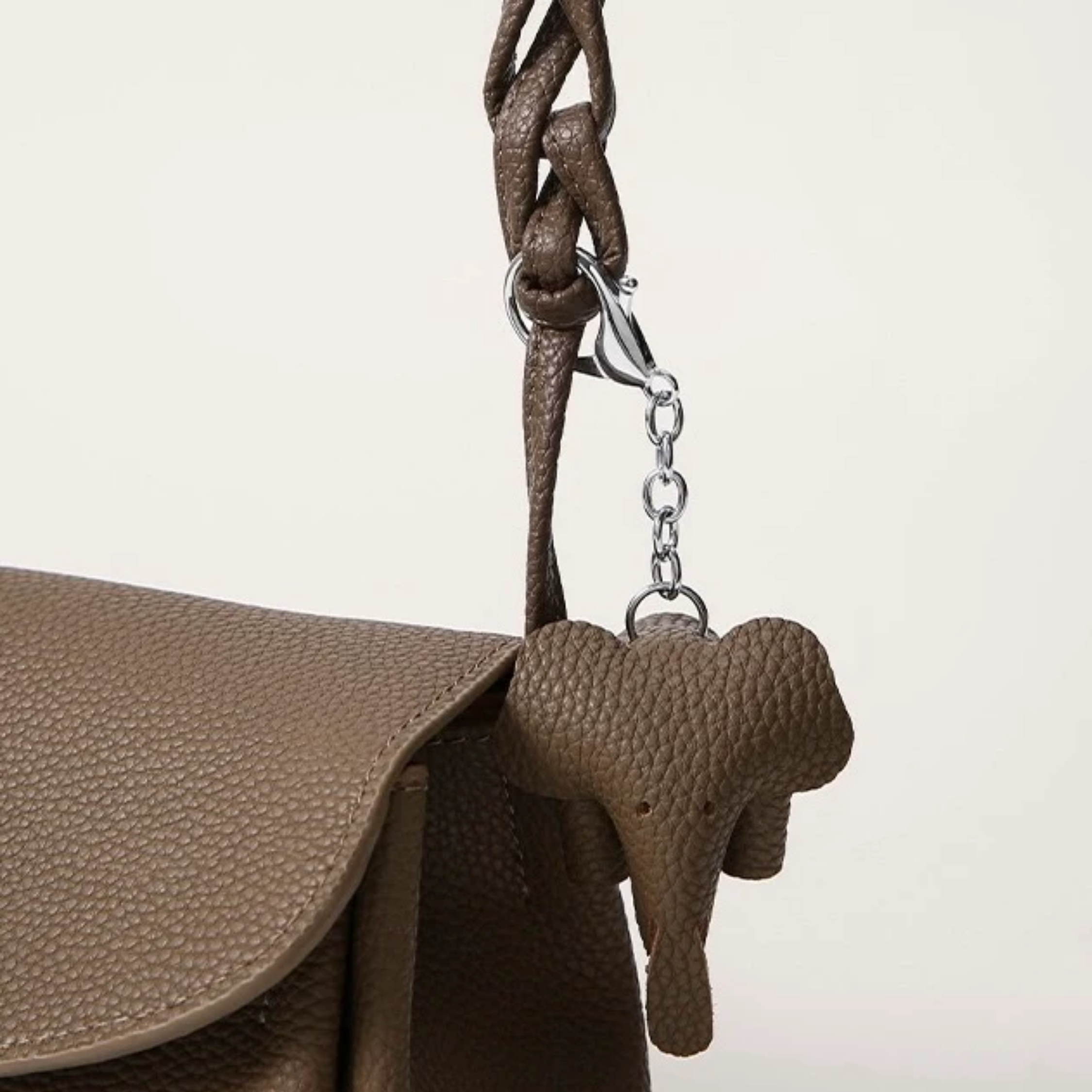 Genuine Leather Crossbody Bag with Mini Elephant Pendant for Everyday Use