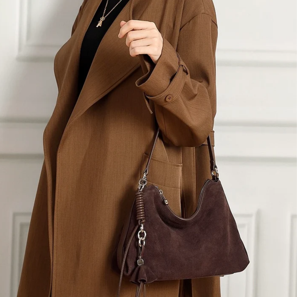 Genuine Leather Hobo Bag with Braided Detail and Tassel Accent for Everyday Use
