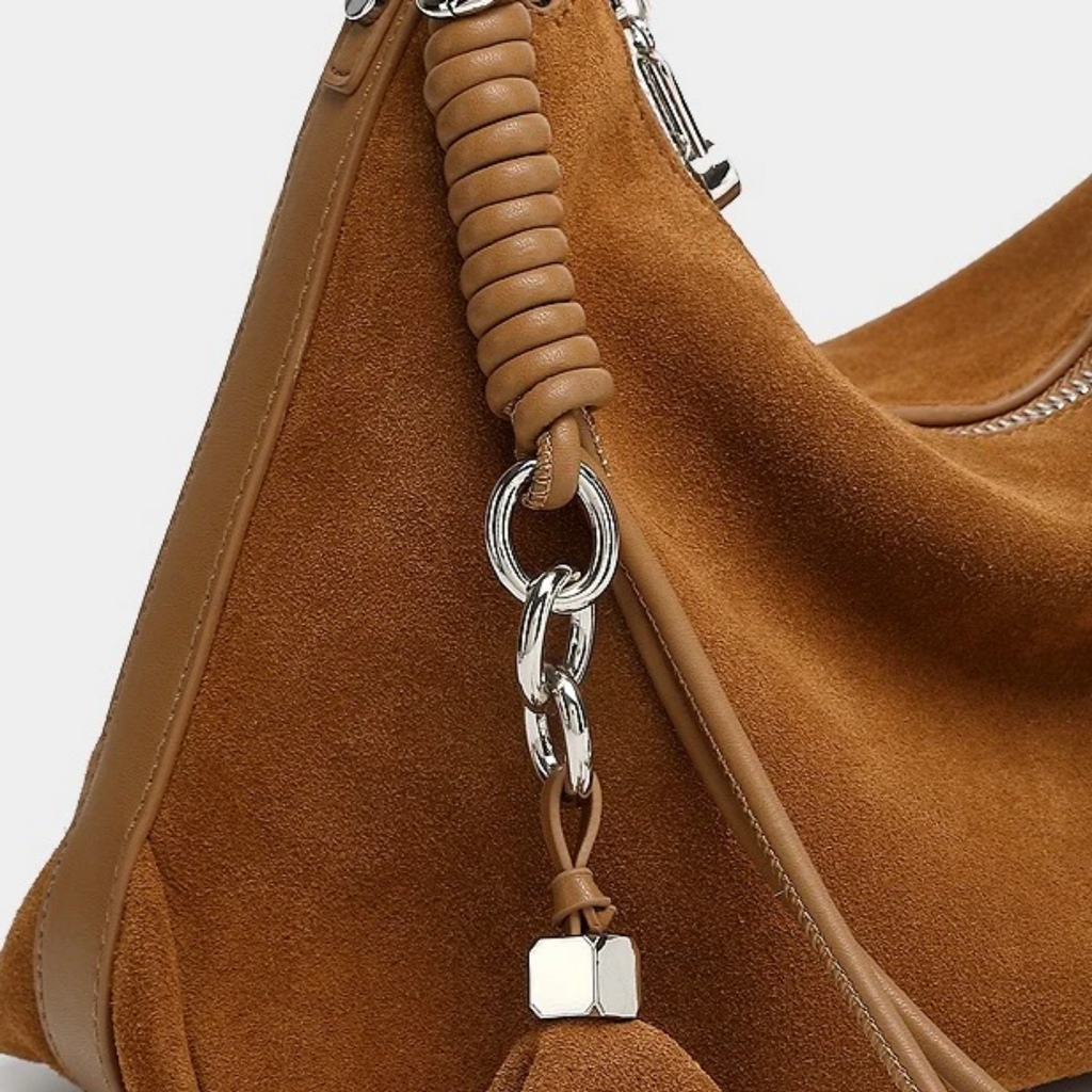 Genuine Leather Hobo Bag with Braided Detail and Tassel Accent for Everyday Use