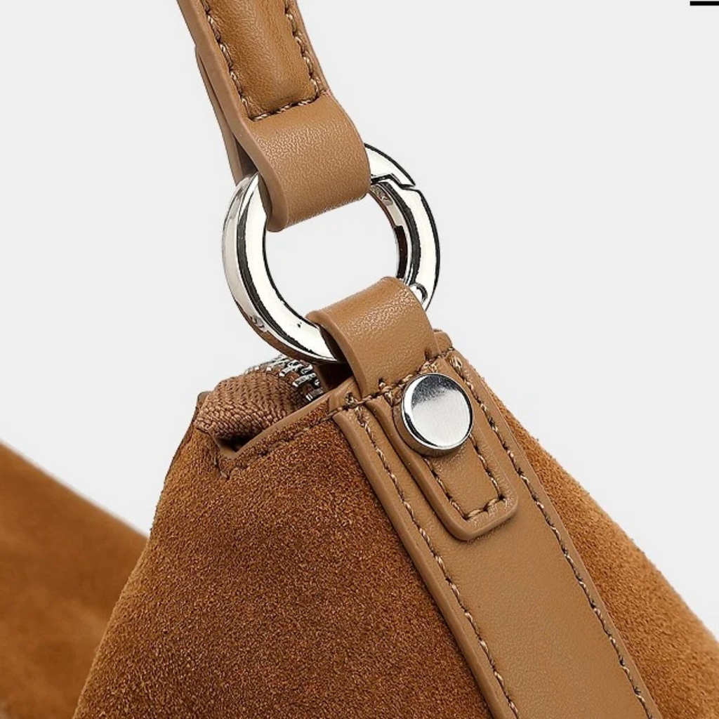 Genuine Leather Hobo Bag with Braided Detail and Tassel Accent for Everyday Use