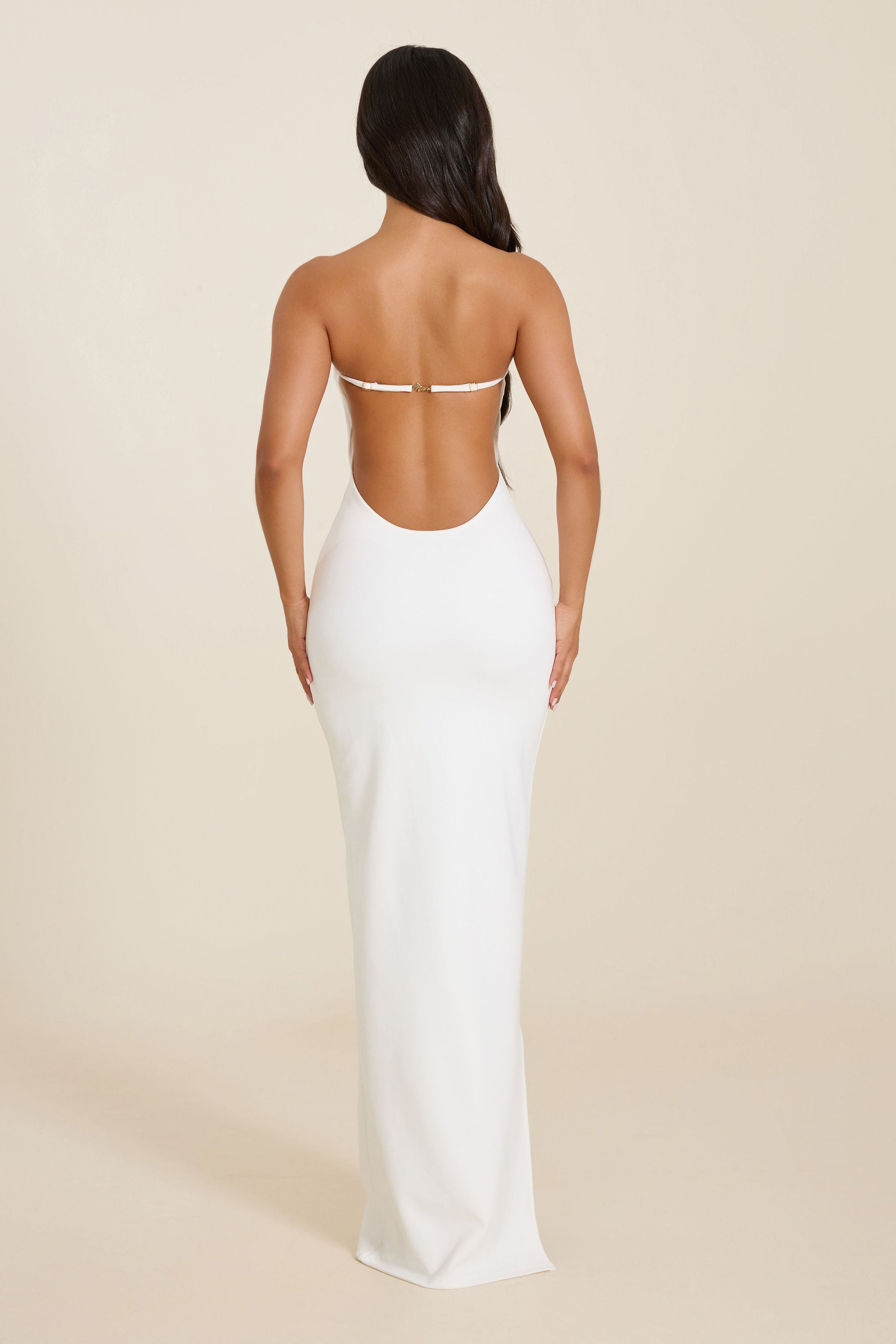 White Strapless Maxi Dress with Sculpted Design for Formal or Casual Wear
